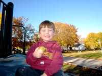 Boy eating apple